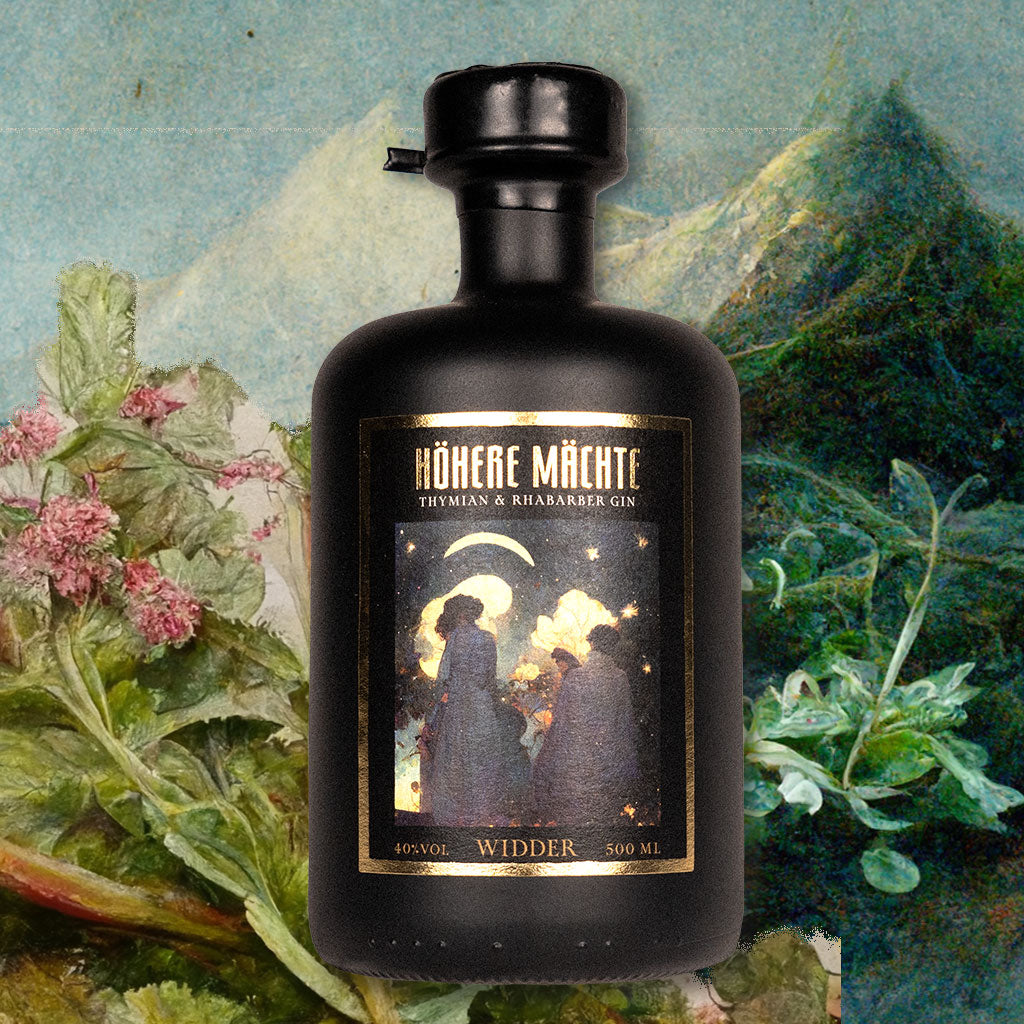 Astro Gin für Sternzeichen Widder. Gin mit Farbwechsel in der schwarzen Designflasche mit Goldetikett.